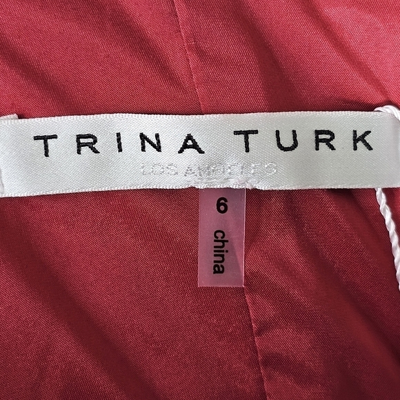 Trina Turk Upbeat One Flounce Shoulder Sheath Dress In Sangria - Picture 8 of 9